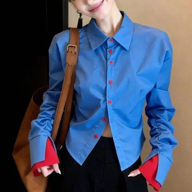Commuter style blue contrasting color shirt women's 2026 spring new long-sleeved waist thin and versatile design top trend
Commuter style blue contrasting color shirt women's 2026 spring new long-sleeved waist thin and versatile design top trend