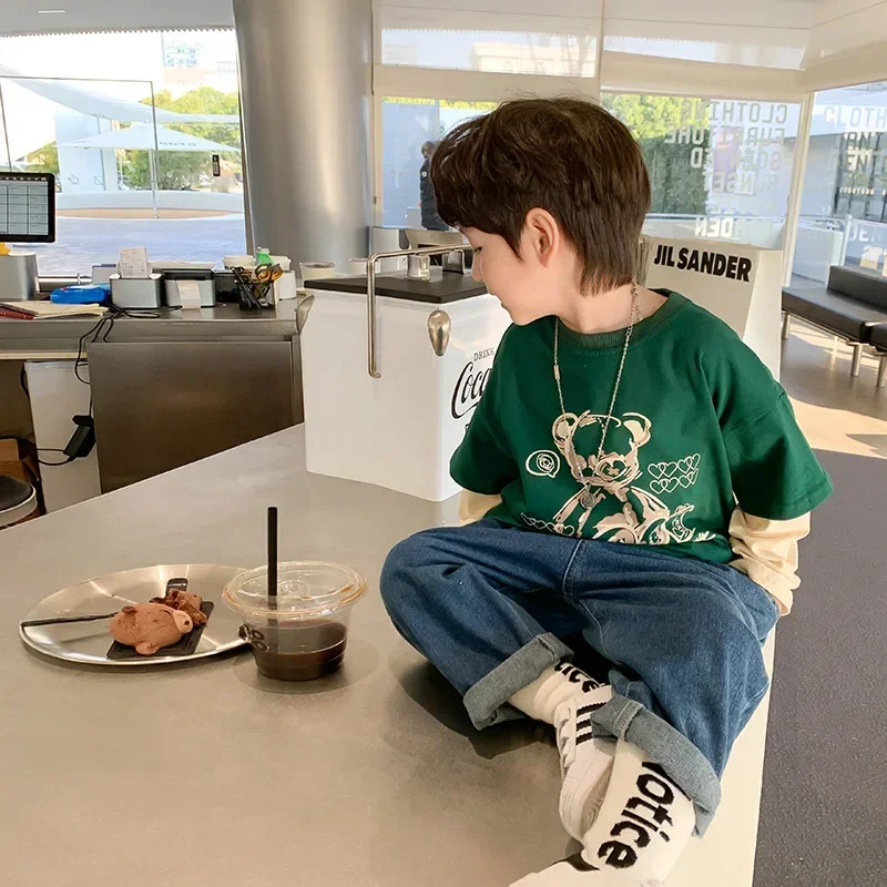Boys cotton fake two pieces casual long sleeve Tees Spring Cartoon bear fashion green patchwork T shirts
Boys cotton fake two pieces casual long sleeve Tees Spring Cartoon bear fashion green patchwork T shirts