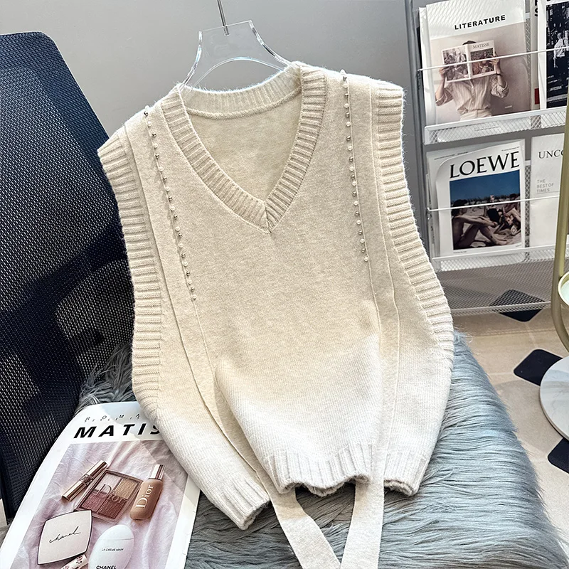 Elegant Bead Knitted Sweater Vest Women's Spring Autumn New V-neck Solid Top Fashionable Sleeveless Loose Fitting Pullover
Elegant Bead Knitted Sweater Vest Women's Spring Autumn New V-neck Solid Top Fashionable Sleeveless Loose Fitting Pullover