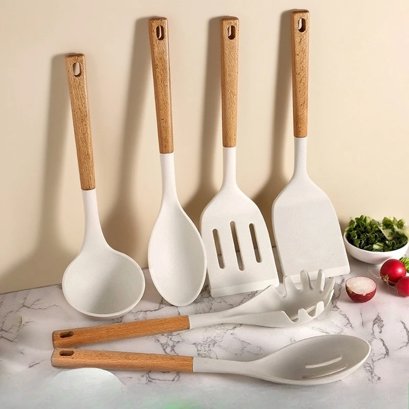 Wooden handle silicone spatula kitchenware set high temperature resistant household non-stick cooking spatula spoon spatula.
Wooden handle silicone spatula kitchenware set high temperature resistant household non-stick cooking spatula spoon spatula.