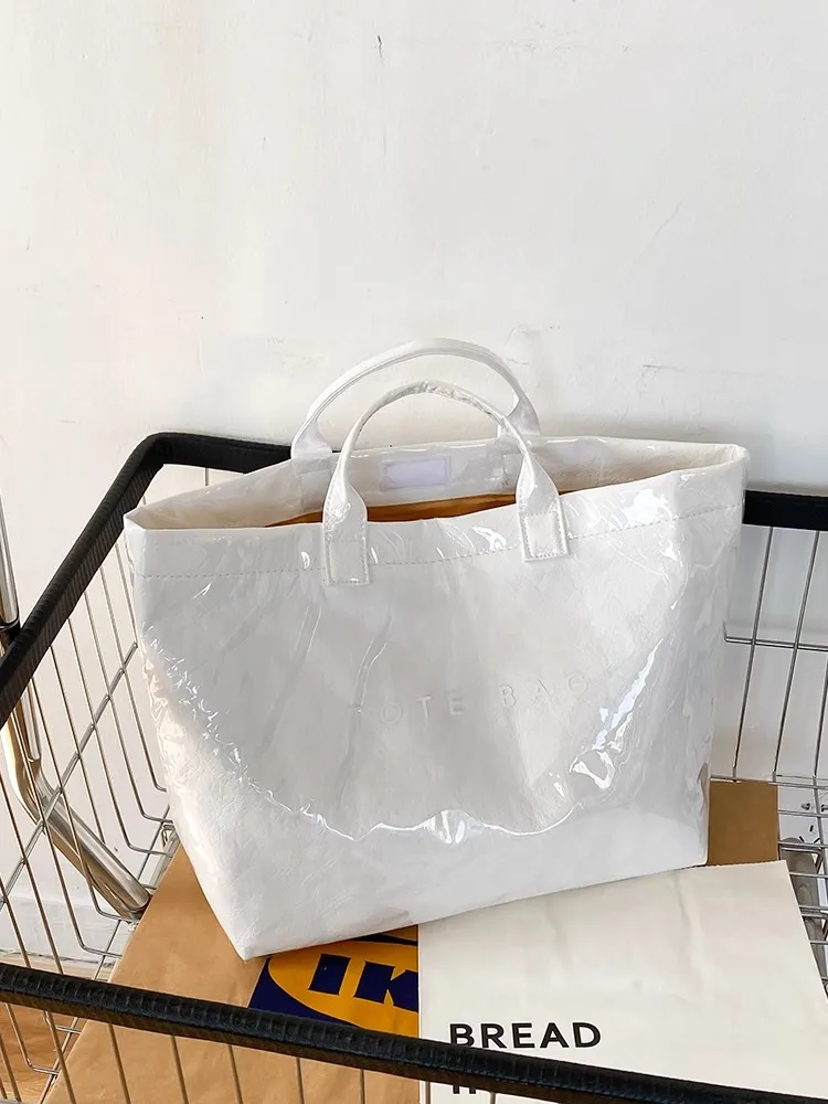 Large Capaci DuPont Paper Jelly Bag Faionable Transparent PVC Waterproof Handbag Commuting Tote Bag Trendy Work Bag
Large Capaci DuPont Paper Jelly Bag Faionable Transparent PVC Waterproof Handbag Commuting Tote Bag Trendy Work Bag