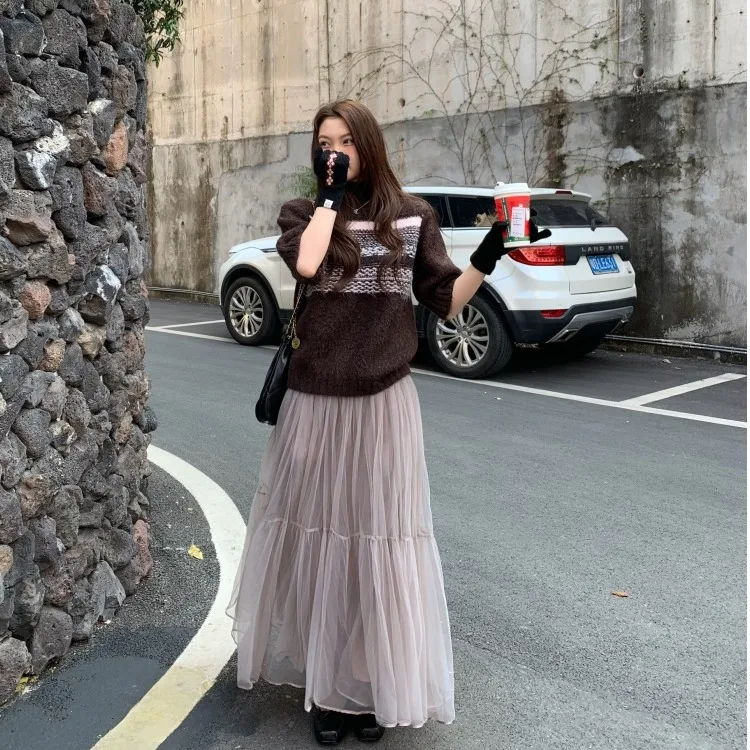 Женская шикарная розовая пушистая многослойная тюлевая юбка-миди в стиле ретро для похудения, универсальная осенне-зимняя новинка для поездок на работу
Женская шикарная розовая пушистая многослойная тюлевая юбка-миди в стиле ретро для похудения, универсальная осенне-зимняя новинка для поездок на работу