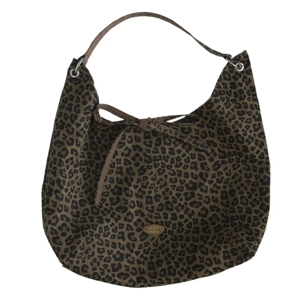 Double-sided Leopard Print Shoulder Bag Casual Large Capacity Artistic Handbag Fashion Work Commuting Handheld Bag
Double-sided Leopard Print Shoulder Bag Casual Large Capacity Artistic Handbag Fashion Work Commuting Handheld Bag
