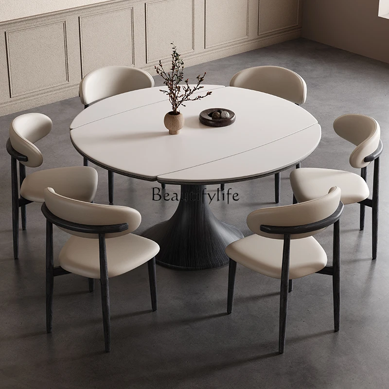 Retractable rock slab dining table square and round dual-purpose modern simple household small apartment
Retractable rock slab dining table square and round dual-purpose modern simple household small apartment
