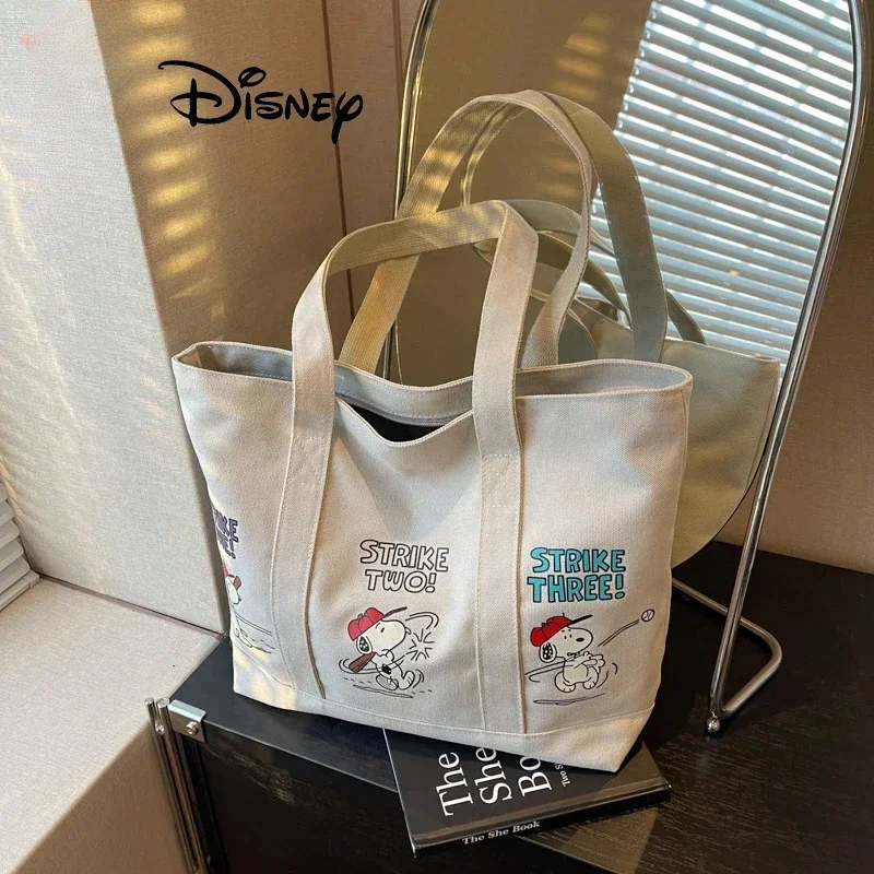 Disney Series Cartoon Large Capacity Handbag Cute Canvas Bag Women Casual Tote Bag New Fashion Snoopy Printing Zip Shoulder Bag
Disney Series Cartoon Large Capacity Handbag Cute Canvas Bag Women Casual Tote Bag New Fashion Snoopy Printing Zip Shoulder Bag