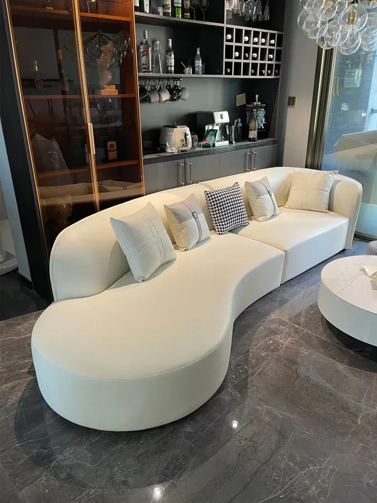 Italian light luxury curved sofa with silicone leather and cream style, modern and simple living room for home use
Italian light luxury curved sofa with silicone leather and cream style, modern and simple living room for home use