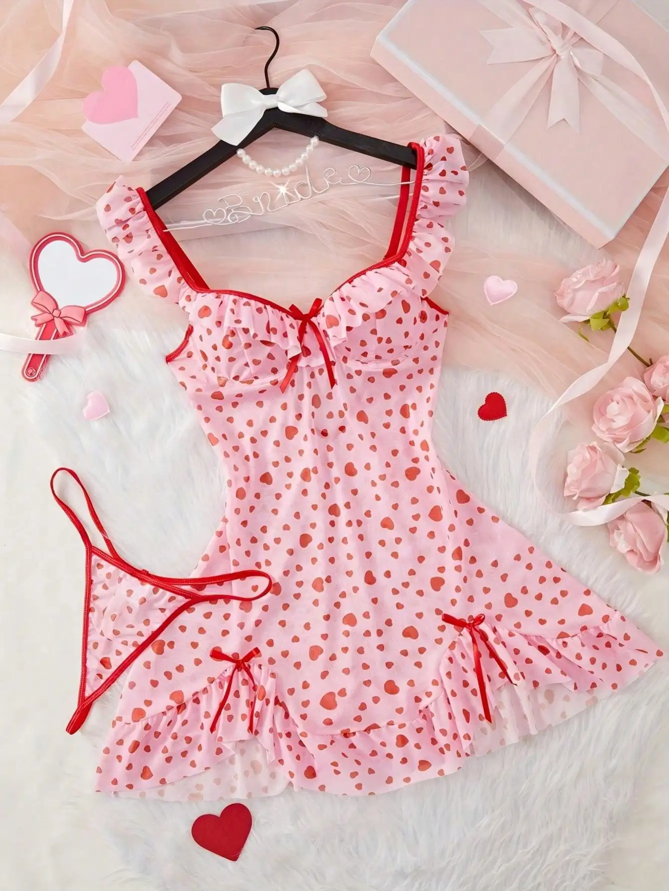 Розовое женское платье для сна с принтом в виде сердечек, рюшами, бантом и отделкой из сатина
Розовое женское платье для сна с принтом в виде сердечек, рюшами, бантом и отделкой из сатина