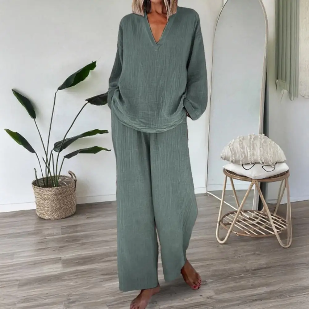 Women's Loose 2-Piece Outfit Long Sleeve V Neck Top Wide Leg Pants with Pockets Fashion Loungewear Casual Women Tracksuit Set
Women's Loose 2-Piece Outfit Long Sleeve V Neck Top Wide Leg Pants with Pockets Fashion Loungewear Casual Women Tracksuit Set