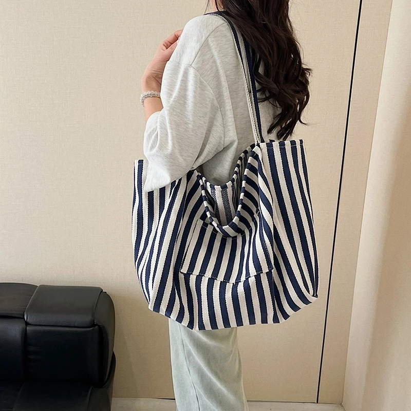 Canvas Lightweight Tote Bag Fashionable Women's Shoulder Bags 2026 New Hot Selling Large Capacity Versatile Handbag Bolso Mujer
Canvas Lightweight Tote Bag Fashionable Women's Shoulder Bags 2026 New Hot Selling Large Capacity Versatile Handbag Bolso Mujer