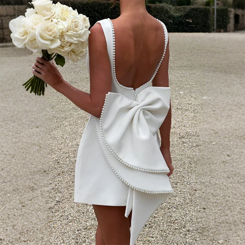 Elegant Pearl Bow Backless Short Dress Women Sleeveless Party Dresses Cute Mini Chic Birthday Evening Y2K Vacation Dress
Elegant Pearl Bow Backless Short Dress Women Sleeveless Party Dresses Cute Mini Chic Birthday Evening Y2K Vacation Dress