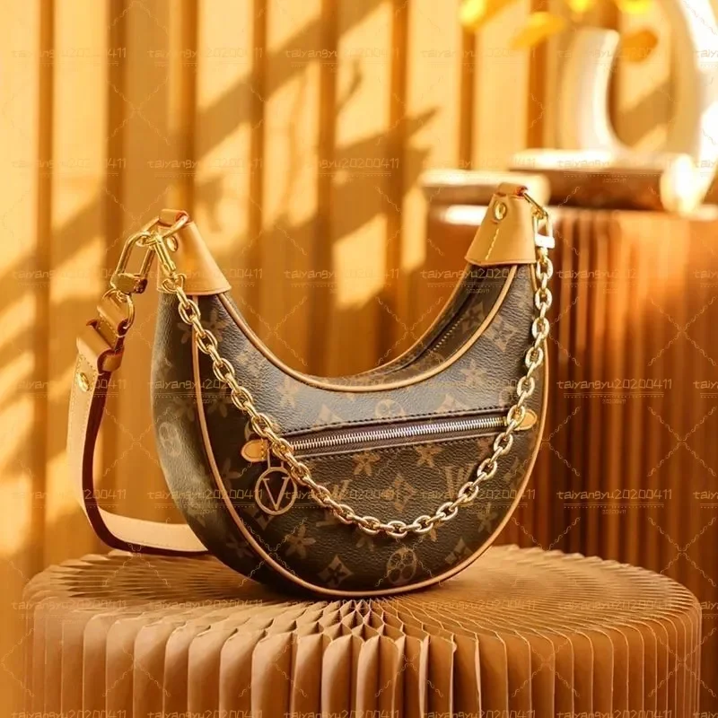 Designer Handbag Women Shoulder Crossbody Bags Vintage Metal Chain Underarm Half Moon Purse Denim LOOP Round Zipper Marelle Pea
Designer Handbag Women Shoulder Crossbody Bags Vintage Metal Chain Underarm Half Moon Purse Denim LOOP Round Zipper Marelle Pea