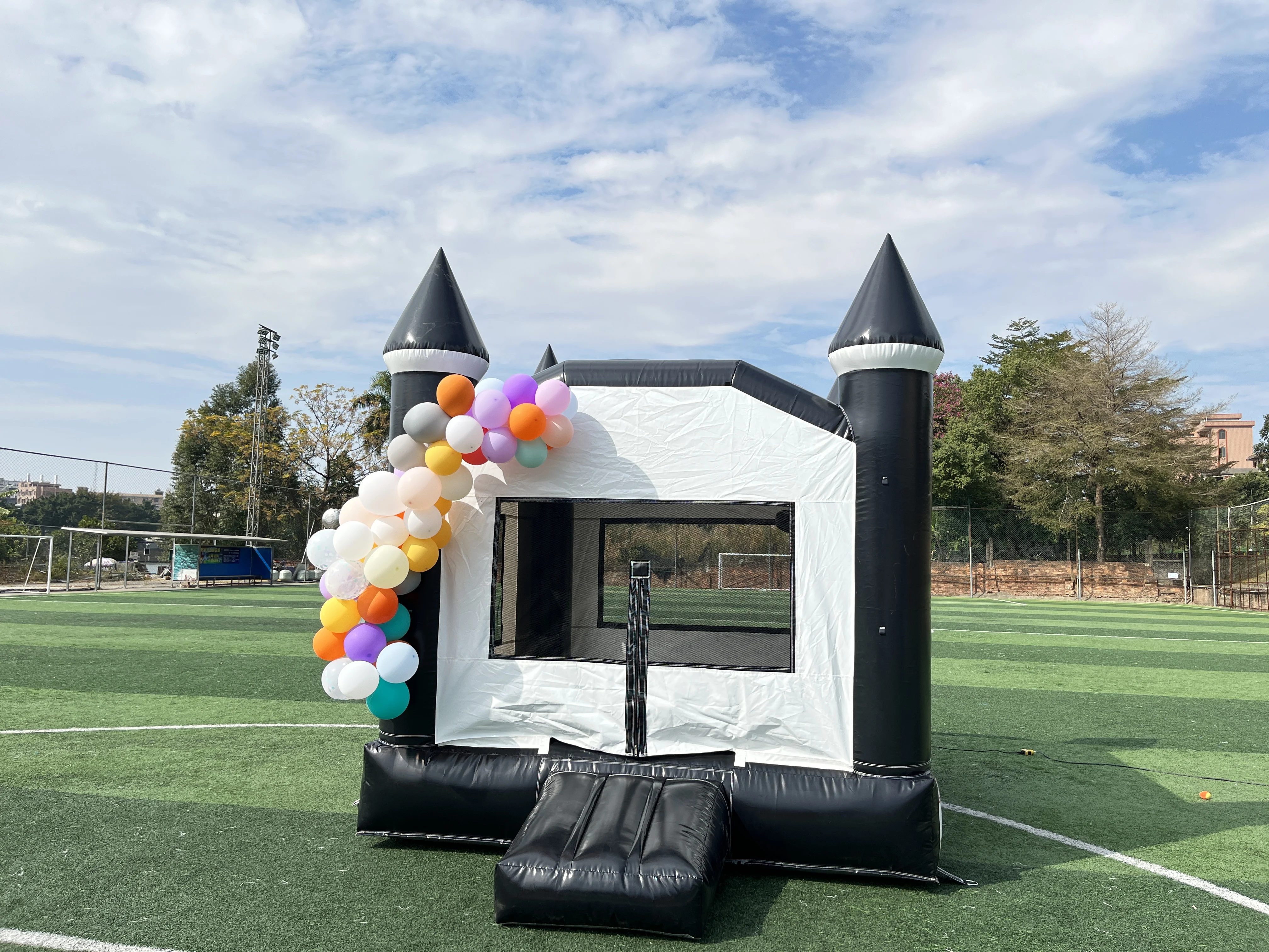 Delightful Black and White Macaron Inflatable Bounce House with Slide - Perfect for Parties and Backyard Fun
Delightful Black and White Macaron Inflatable Bounce House with Slide - Perfect for Parties and Backyard Fun