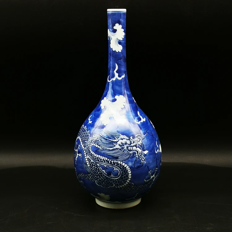Qing Kangxi's Blue and White Flower Seawater Dragon Pattern Vase Hand-painted Antique ItemsAncient Style Decoration
Qing Kangxi's Blue and White Flower Seawater Dragon Pattern Vase Hand-painted Antique ItemsAncient Style Decoration