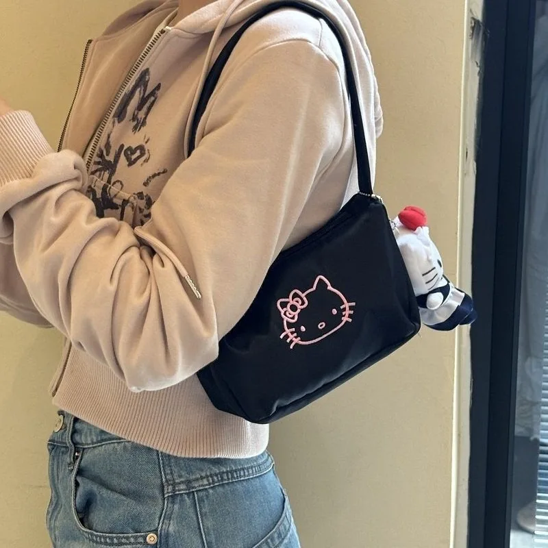 Cute Sanrio Hello Kitty Women Shoulder Bag Cartoon Handbag with Embroidered KT Pattern Versatile Portable Crossbody Bag Gifts
Cute Sanrio Hello Kitty Women Shoulder Bag Cartoon Handbag with Embroidered KT Pattern Versatile Portable Crossbody Bag Gifts