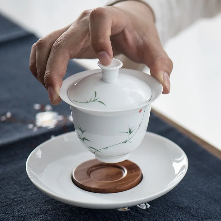 Hand-Painted Underglaze Ceramic White Porcelain Tea Set from Jingdezhen Pure Hand-Drawn Blue Bamboo Three-Axis Bowl
Hand-Painted Underglaze Ceramic White Porcelain Tea Set from Jingdezhen Pure Hand-Drawn Blue Bamboo Three-Axis Bowl