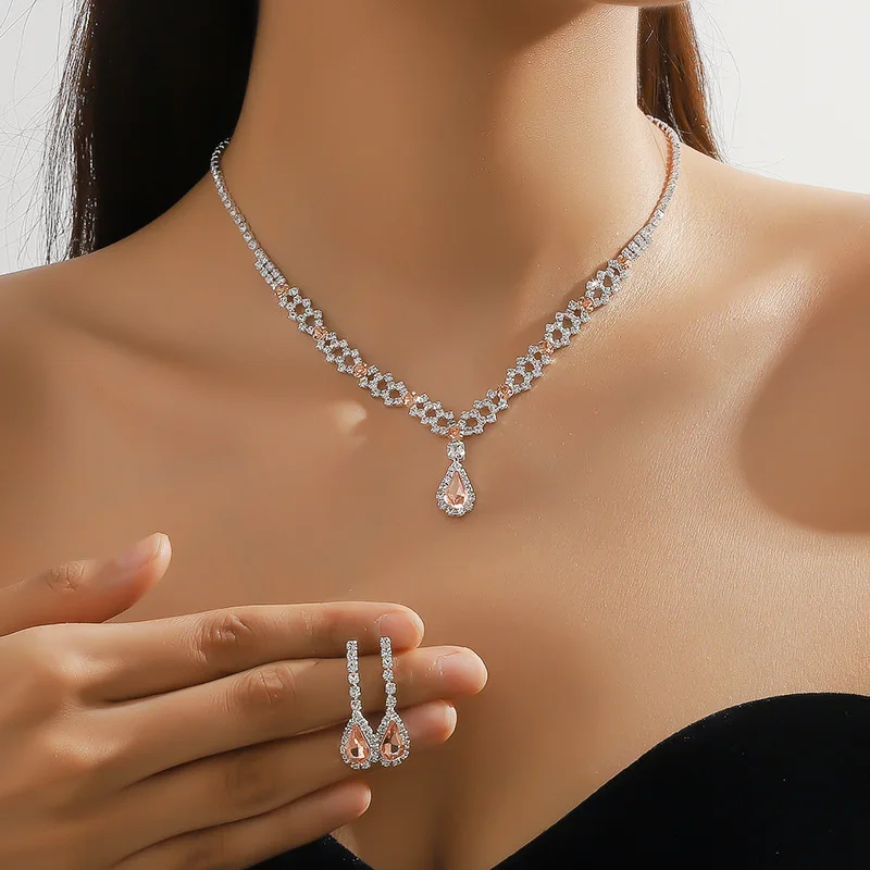 Exquisite Claw Chain Necklace and Earrings Suite Two-Piece Set Peach Pink Water Drop Necklace Clavicle Chain Dinner Accessories
Exquisite Claw Chain Necklace and Earrings Suite Two-Piece Set Peach Pink Water Drop Necklace Clavicle Chain Dinner Accessories