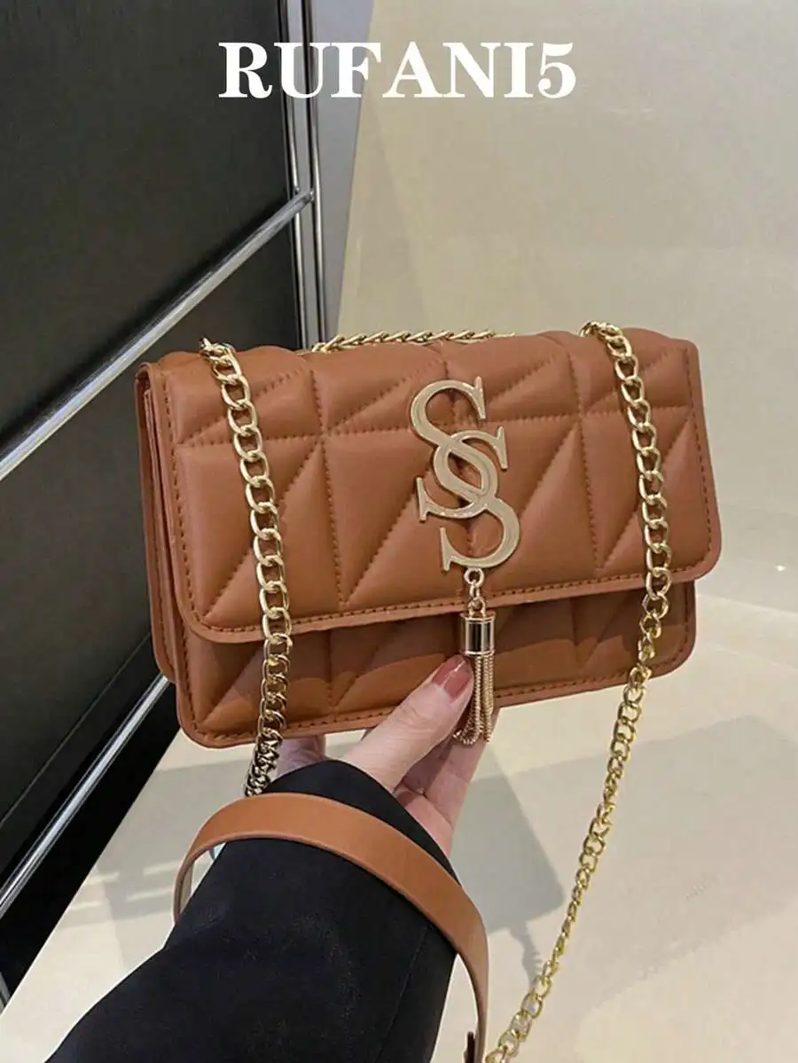 Tan Quilted Flap Crossbody Bag with Gold Chain Strap and Tassel Detail
Tan Quilted Flap Crossbody Bag with Gold Chain Strap and Tassel Detail