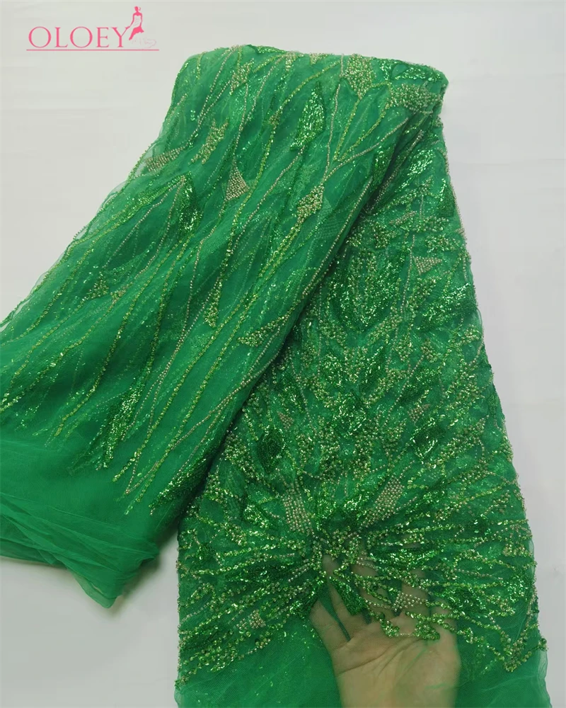 Новая высококачественная роскошная французская вышивка, тяжелая кружевная ткань для жениха в африканском нигерийском стиле с блестками, ткань для свадьбы
Новая высококачественная роскошная французская вышивка, тяжелая кружевная ткань для жениха в африканском нигерийском стиле с блестками, ткань для свадьбы