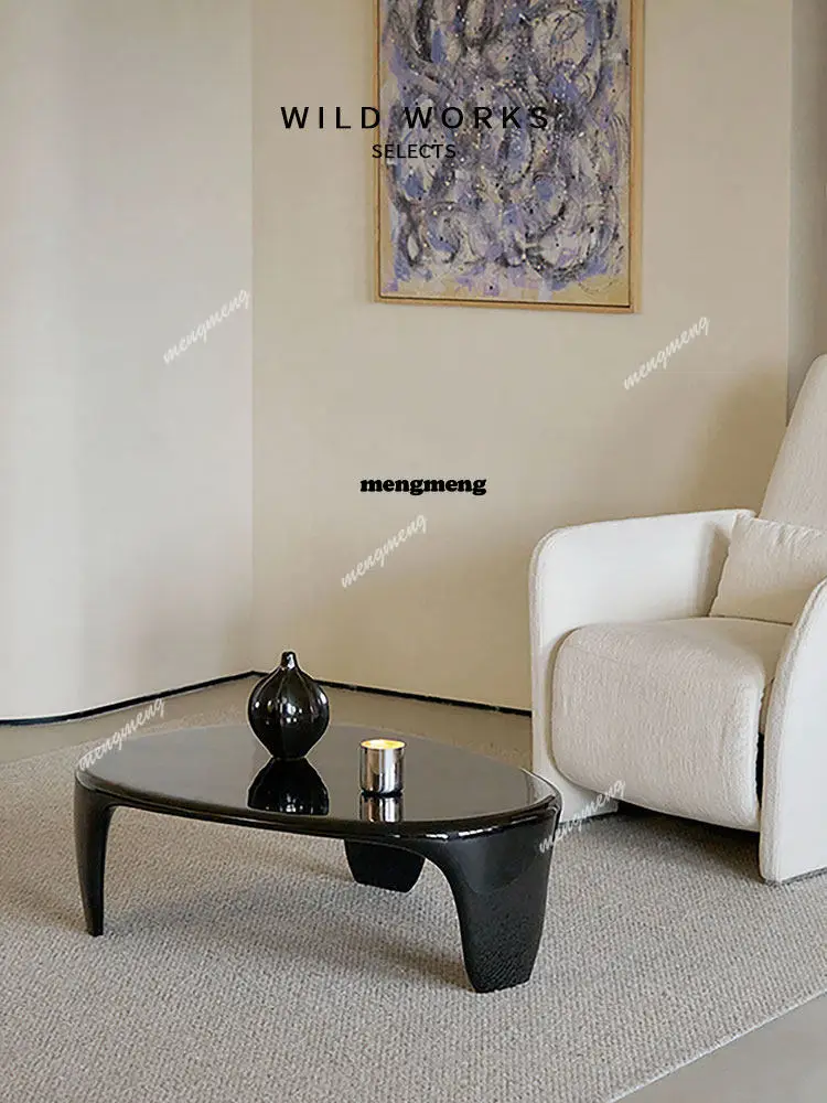 French wabi-sabi special-shaped coffee table living room designer solid fiberglass oval table
French wabi-sabi special-shaped coffee table living room designer solid fiberglass oval table