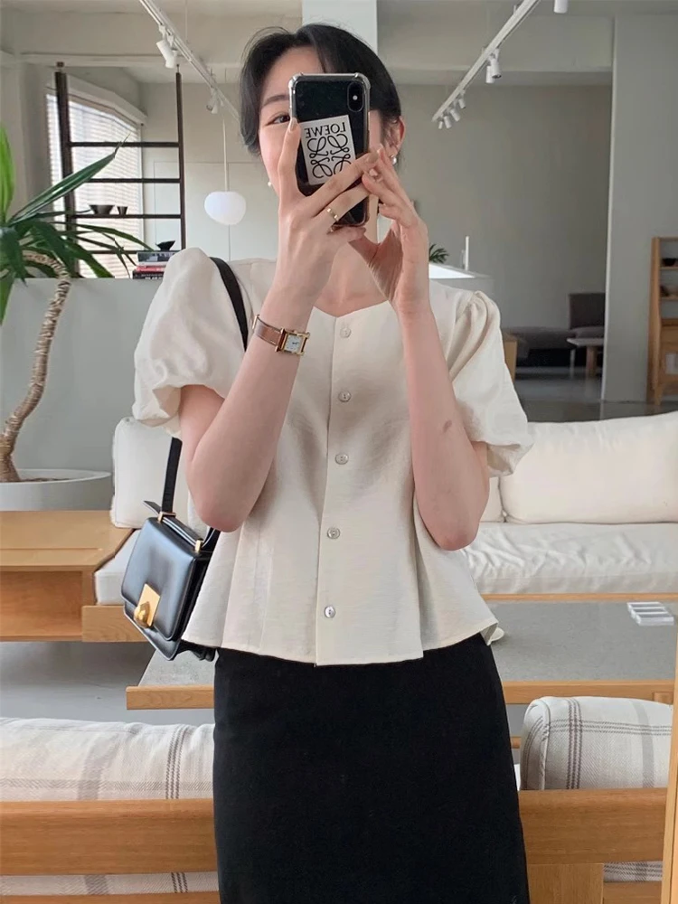 Chic Summer Simple Elegance round Ne Small Button Pleated Loose Versatile ort Sve Bubble Sve irt for Women
Chic Summer Simple Elegance round Ne Small Button Pleated Loose Versatile ort Sve Bubble Sve irt for Women