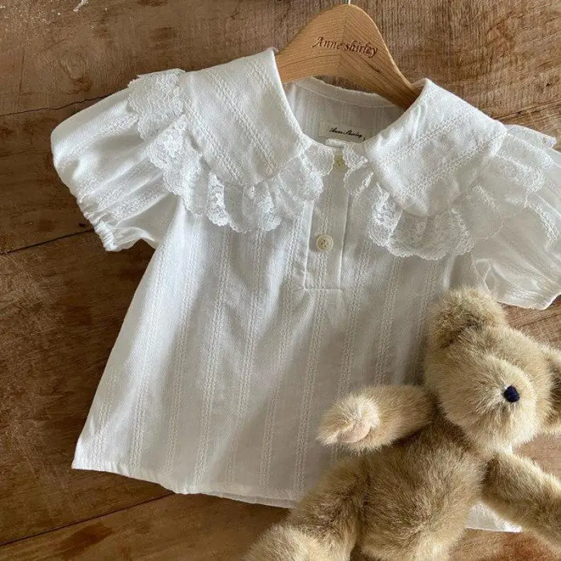 2026 Summer New Children Short Sleeve Shirts Solid Girls Lace Lapel Tops Cotton Toddler Peter Pan Collar Shirts Kids Clothes
2026 Summer New Children Short Sleeve Shirts Solid Girls Lace Lapel Tops Cotton Toddler Peter Pan Collar Shirts Kids Clothes