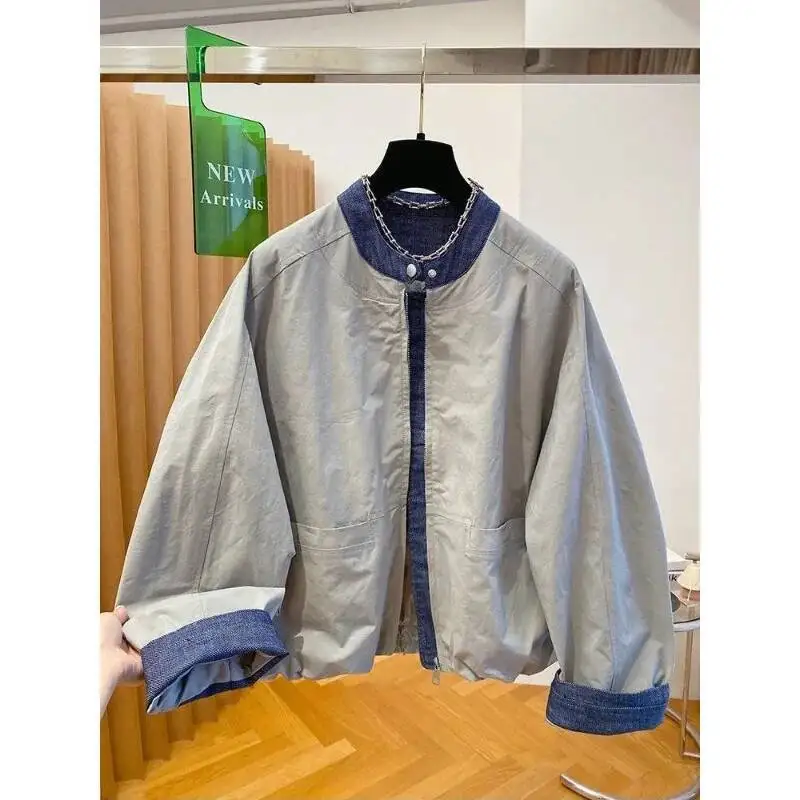 Korean Design Niche Denim Splicing Women's 2025 New Loose Stand-Up Collar Jacket Spring Coat
Korean Design Niche Denim Splicing Women's 2025 New Loose Stand-Up Collar Jacket Spring Coat
