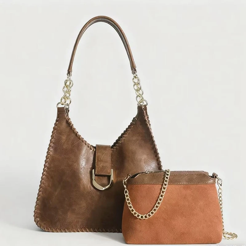 Мягкая кожаная сумка через плечо в стиле ретро 2026, модная женская сумка подмышки, универсальная сумка для мамы и дочки, новинка в пригородном стиле
Мягкая кожаная сумка через плечо в стиле ретро 2026, модная женская сумка подмышки, универсальная сумка для мамы и дочки, новинка в пригородном стиле