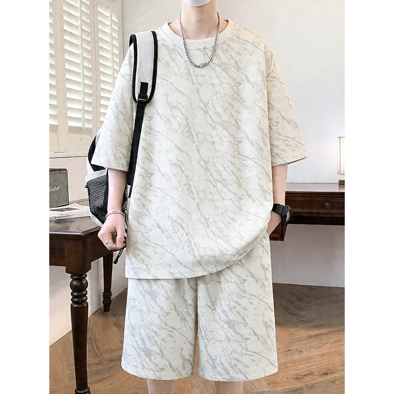 2026 Ice Silk Casual Suit Men's Summer New Cool Quick-drying Round Neck T-shirt Short-sleeved Shorts Two-piece Set with A Set
2026 Ice Silk Casual Suit Men's Summer New Cool Quick-drying Round Neck T-shirt Short-sleeved Shorts Two-piece Set with A Set