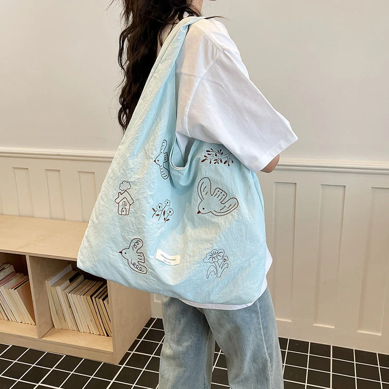 2026Summer new niche bird embroidery underarm bag for women, large capacity, versatile, lightweight, quick-drying nylon canvas b
2026Summer new niche bird embroidery underarm bag for women, large capacity, versatile, lightweight, quick-drying nylon canvas b