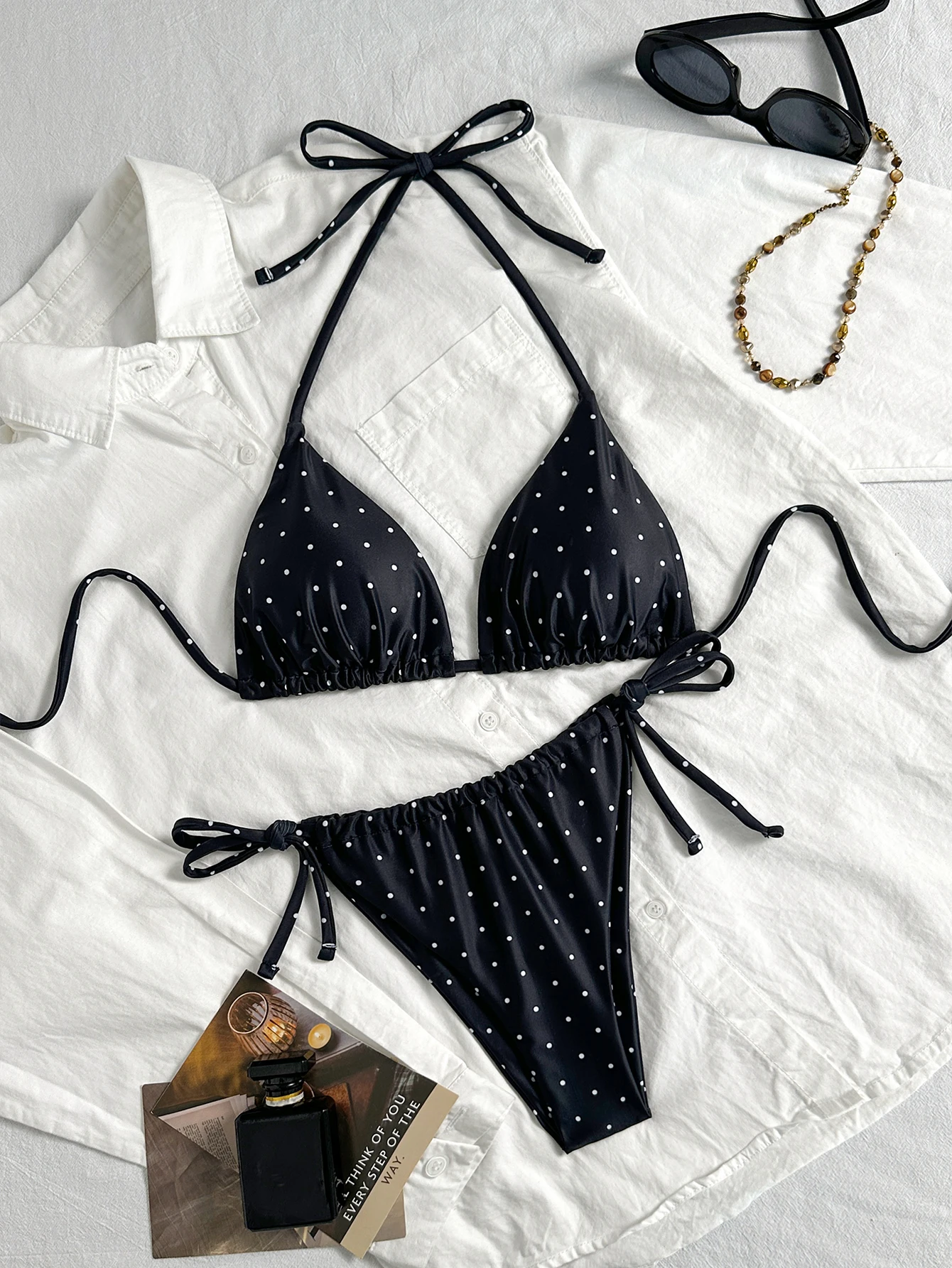 Women's Fashion Bikini Set, Black Polka Dot Print, Hot-Selling Sexy Tie-Neck Triangle Cup, Side-Tie Briefs, Two-Piece Set, Slimming, Suitable for Hot Springs, Swimming, Photoshoots, and Vacation Swimwear
Women's Fashion Bikini Set, Black Polka Dot Print, Hot-Selling Sexy Tie-Neck Triangle Cup, Side-Tie Briefs, Two-Piece Set, Slimming, Suitable for Hot Springs, Swimming, Photoshoots, and Vacation Swimwear