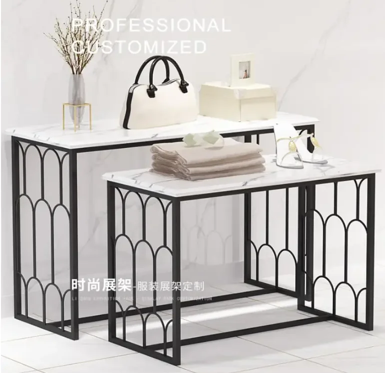 Clothing store display rack rectangular high and low display rack placed in the middle of the shoe bag rack table
Clothing store display rack rectangular high and low display rack placed in the middle of the shoe bag rack table