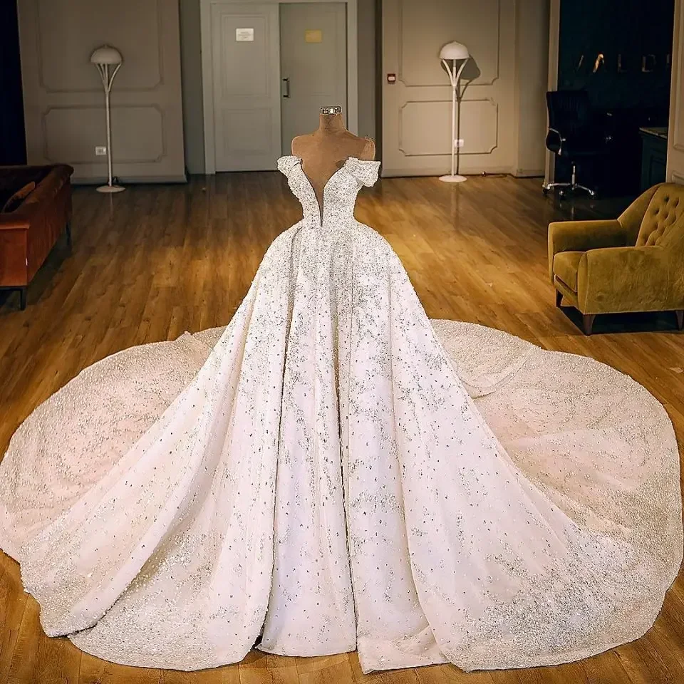 Customized Sweetheart Heavy Crystals Beads Ballgown Wedding Dress Vestidos De Novia 2025 Plus Size Off Shoulder Bridal Gowns
Customized Sweetheart Heavy Crystals Beads Ballgown Wedding Dress Vestidos De Novia 2025 Plus Size Off Shoulder Bridal Gowns