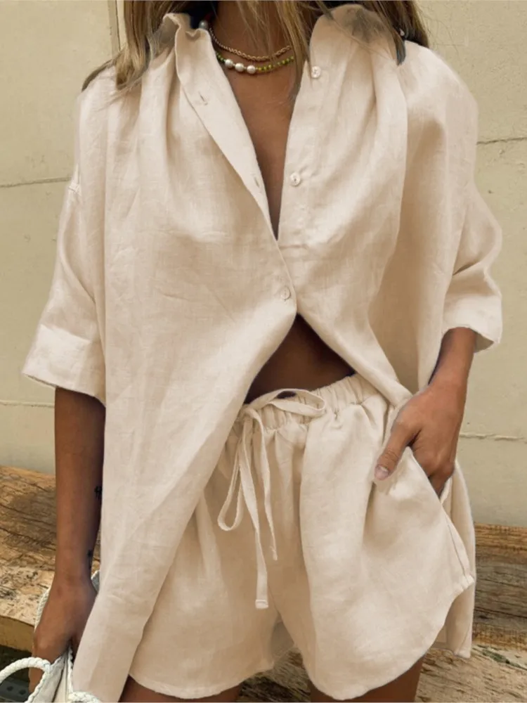 Summer Simple Solid Color Button Short-sleeved Shirt Wide-leg Lace-on Shorts Two-piece Set Women's Comfortable Casual Shorts Set
Summer Simple Solid Color Button Short-sleeved Shirt Wide-leg Lace-on Shorts Two-piece Set Women's Comfortable Casual Shorts Set