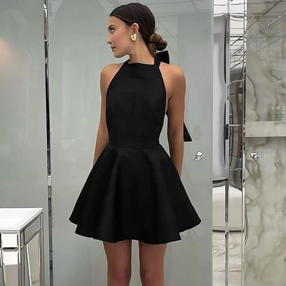 French sexy black high waisted sleeveless hanging neck dress 2025 European and American new spring fashion short skirt for women
French sexy black high waisted sleeveless hanging neck dress 2025 European and American new spring fashion short skirt for women
