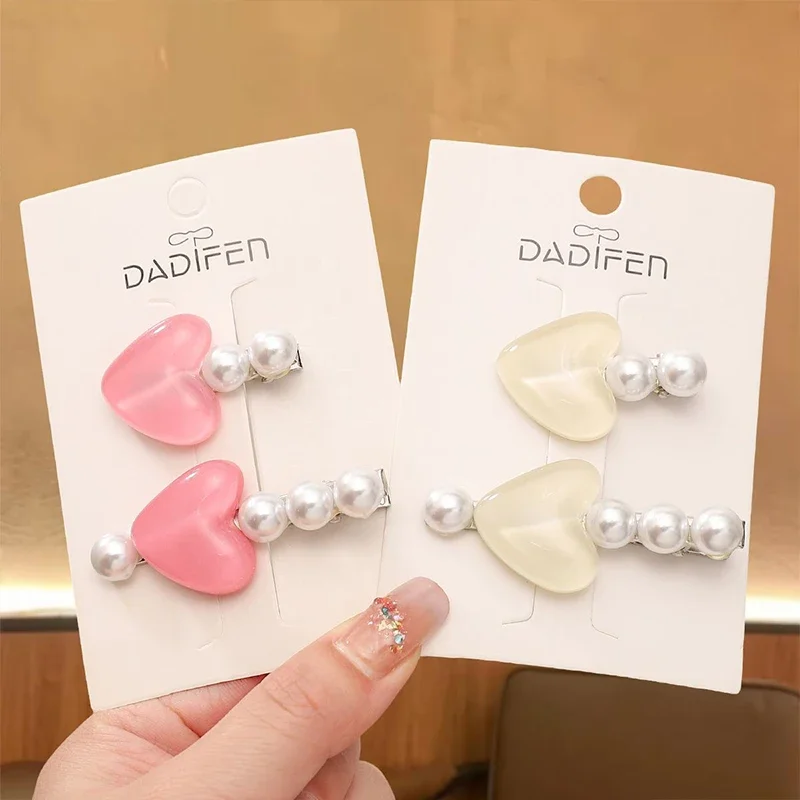 New 2Pcs Sweet Pearl Love Heart Hairpin Women Elegant Temperament Side Hair Clip Girls Gift Hair Accessories Headdresses
New 2Pcs Sweet Pearl Love Heart Hairpin Women Elegant Temperament Side Hair Clip Girls Gift Hair Accessories Headdresses