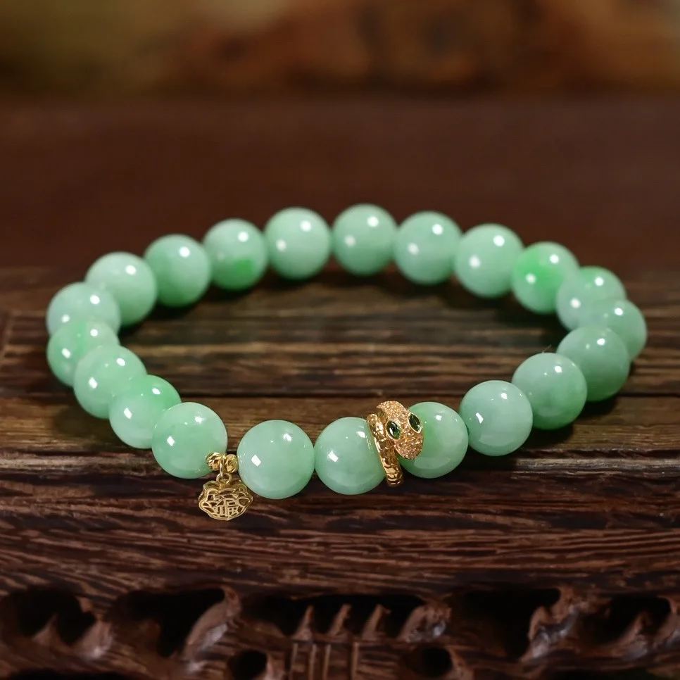 Natural Grade A Green Jadeite Round Bead Bracelet, 18K Gold Snake Charm Hollow Ruyi Pendant Women Wrist Jewelry
Natural Grade A Green Jadeite Round Bead Bracelet, 18K Gold Snake Charm Hollow Ruyi Pendant Women Wrist Jewelry