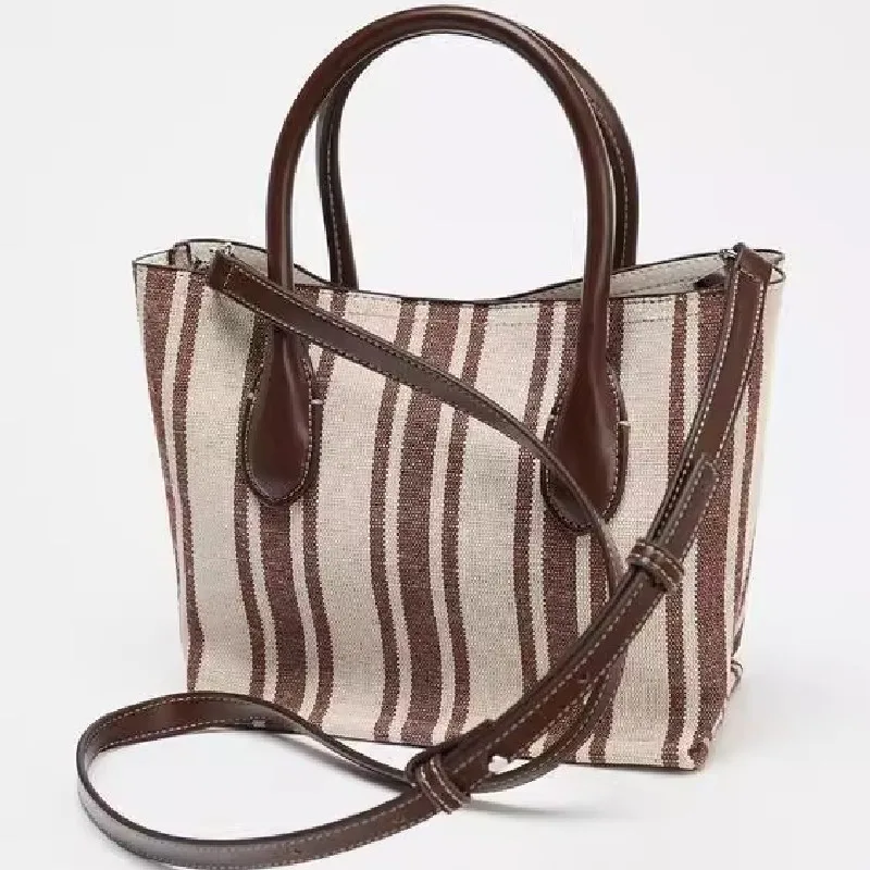 Горячая распродажа сезона, новая женская холщовая сумка-тоут большой вместимости, сумка через плечо для колледжа, простая полосатая сумка в повседневном стиле 
Горячая распродажа сезона, новая женская холщовая сумка-тоут большой вместимости, сумка через плечо для колледжа, простая полосатая сумка в повседневном стиле