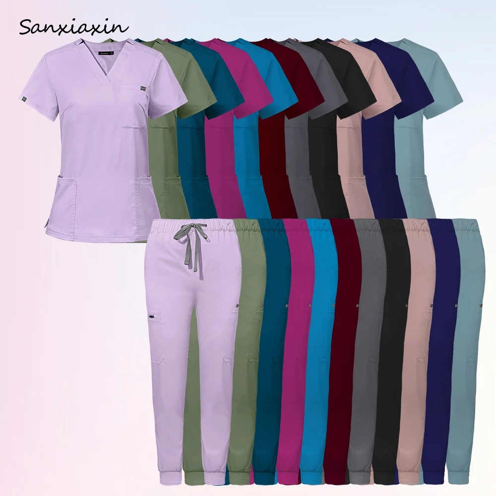 Разноцветные скрабы, костюмы для врачей и медсестер, спецодежда с карманами, топы с v-образным вырезом, брюки для бега, униформа для кормления, комплект медицинской рабочей одежды для клиники 
Разноцветные скрабы, костюмы для врачей и медсестер, спецодежда с карманами, топы с v-образным вырезом, брюки для бега, униформа для кормления, комплект медицинской рабочей одежды для клиники