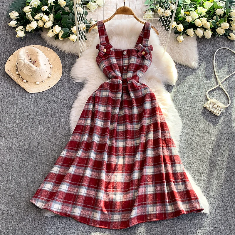 Sweet plaid contrasting color age reducing bow suspender dress for women in autumn winter high-end woolen long skirt
Sweet plaid contrasting color age reducing bow suspender dress for women in autumn winter high-end woolen long skirt