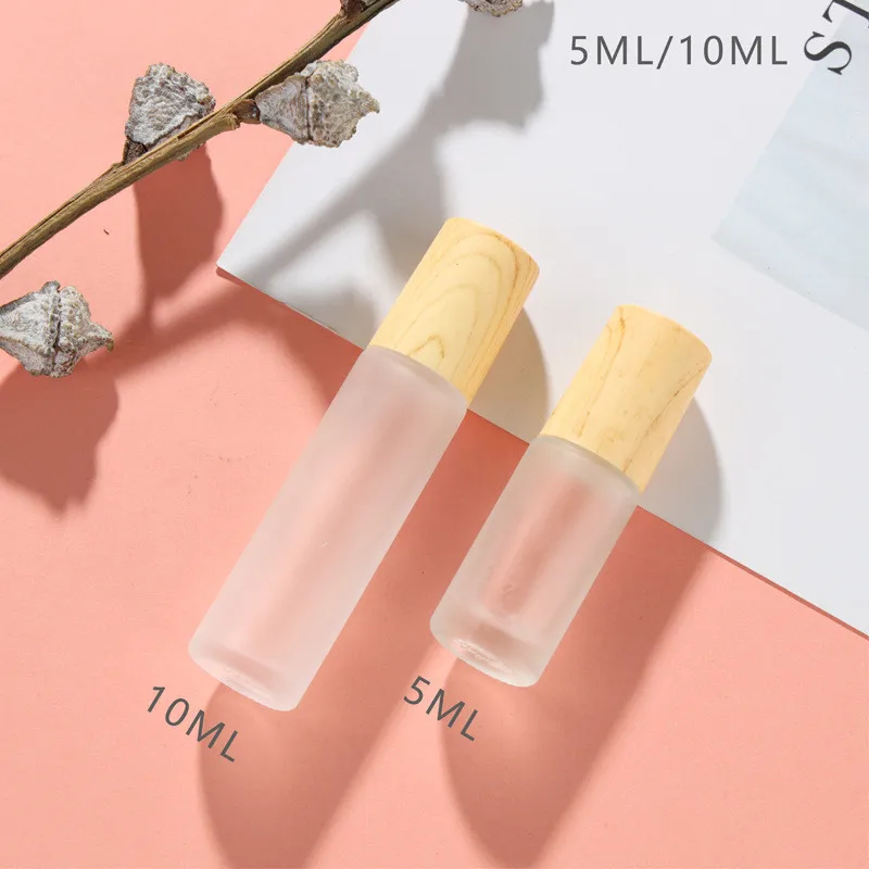 20pcs/lot Matte Glass Roll On Bottle with Wooden Cap Frost Essential Oil Bottles Travel Refillable Packaging Bottle
20pcs/lot Matte Glass Roll On Bottle with Wooden Cap Frost Essential Oil Bottles Travel Refillable Packaging Bottle