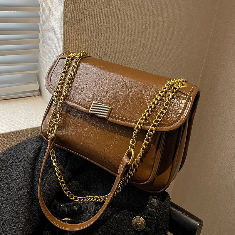 Retro Chain Shoulder Bag for Women Solid Pu Flap Square Handle Bags Large Capacity Female Popular Commute Crossbody Packs
Retro Chain Shoulder Bag for Women Solid Pu Flap Square Handle Bags Large Capacity Female Popular Commute Crossbody Packs