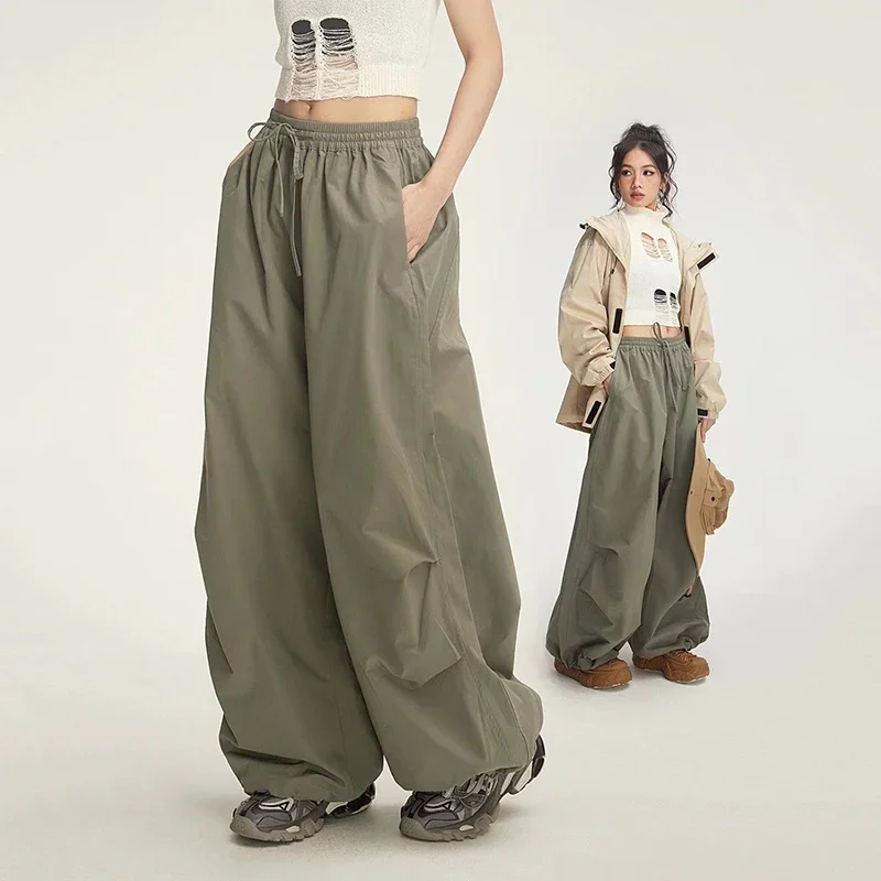 High Waist Streetwear Women Wide Leg Pants Hip Hop Oversized Baggy Joggers Trousers Y2K Fashion Elastic Waist Parachute Pants
High Waist Streetwear Women Wide Leg Pants Hip Hop Oversized Baggy Joggers Trousers Y2K Fashion Elastic Waist Parachute Pants