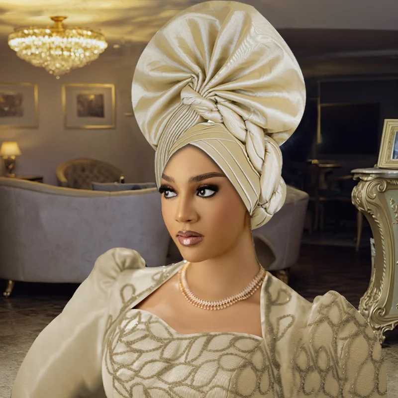 Nigerian Gele Headtie Aso Oke 2025 High Quality African Aso Oke Gele Already Made Auto Gele African Turban Cap for Party Wedding
Nigerian Gele Headtie Aso Oke 2025 High Quality African Aso Oke Gele Already Made Auto Gele African Turban Cap for Party Wedding