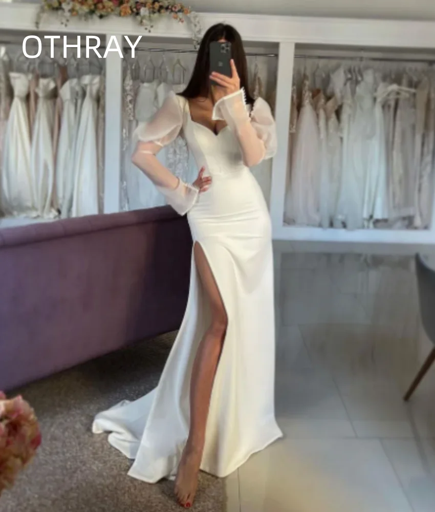 Современное платье невесты с длинными рукавами и разрезом по бокам, простое арабское современное свадебное платье, элегантные свадебные платья русалки
Современное платье невесты с длинными рукавами и разрезом по бокам, простое арабское современное свадебное платье, элегантные свадебные платья русалки