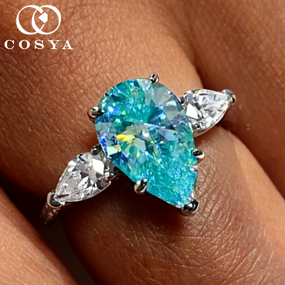 COSYA 1-3CT Pear Paraiba Green Moissanite 3 stone Ring for Women S925 Silver Waterdrop Lab Diamond Wedding Band Fine Jewelry
COSYA 1-3CT Pear Paraiba Green Moissanite 3 stone Ring for Women S925 Silver Waterdrop Lab Diamond Wedding Band Fine Jewelry