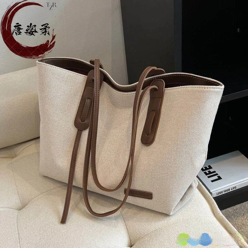 Casual Canvas Shoulder Bag Large Capacity Versatile Women's Bag Commuting Class Tote Bag Soft Handle Polyester Washable
Casual Canvas Shoulder Bag Large Capacity Versatile Women's Bag Commuting Class Tote Bag Soft Handle Polyester Washable