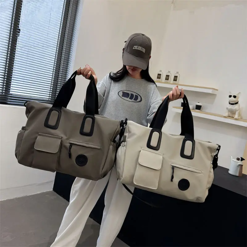 Large Capacity Oxford Cloth Fitness bag, luggage bag,travel bag, yoga bag,portable swimming bag,casual British simple travel bag
Large Capacity Oxford Cloth Fitness bag, luggage bag,travel bag, yoga bag,portable swimming bag,casual British simple travel bag