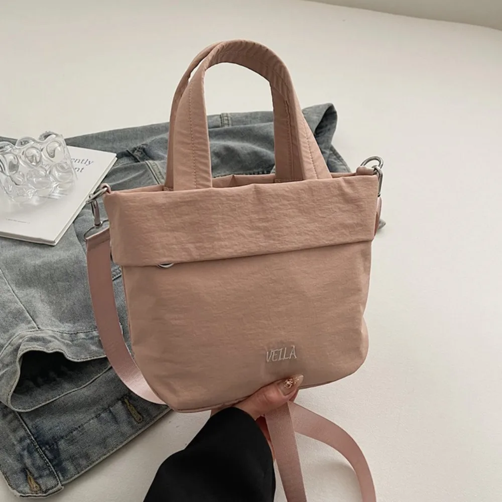 Casual Solid Color Nylon Cloth Bucket Bag Purse Leisure Oxford Cloth Handbag Commuting Lightweight Canvas Messenger Bag Outdoor
Casual Solid Color Nylon Cloth Bucket Bag Purse Leisure Oxford Cloth Handbag Commuting Lightweight Canvas Messenger Bag Outdoor