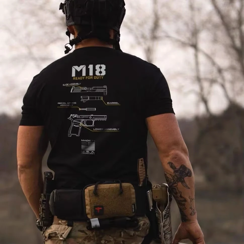 Американская летняя мужская футболка M18 для тактической стрельбы в стиле милитари для соревнований на открытом воздухе, тренировочная футболка с круглым вырезом и короткими рукавами с принтом
Американская летняя мужская футболка M18 для тактической стрельбы в стиле милитари для соревнований на открытом воздухе, тренировочная футболка с круглым вырезом и короткими рукавами с принтом