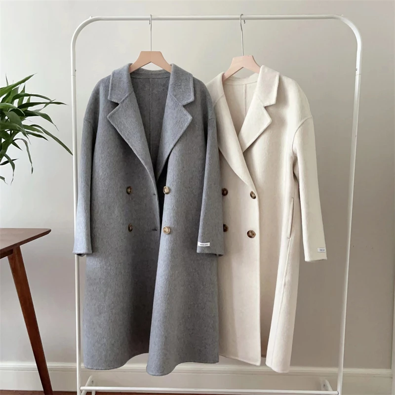 Новое осеннее женское шерстяное пальто 2026 года, длинное, из двойного кашемира, в корейском стиле, свободного кроя, элегантное, для повседневной носки
Новое осеннее женское шерстяное пальто 2026 года, длинное, из двойного кашемира, в корейском стиле, свободного кроя, элегантное, для повседневной носки